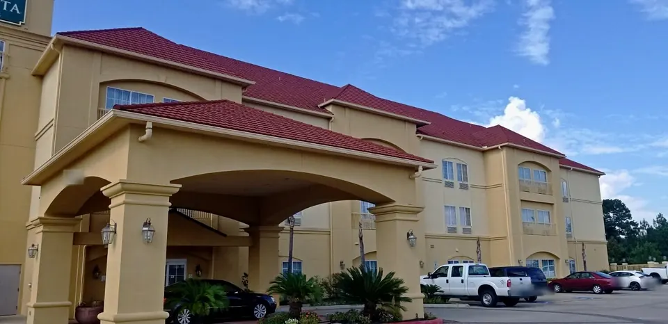 Before: the yellow porte-cochère and main wing